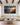 Isaiah 40:31 canvas wall art above an ivory sofa in the great room of a Mediterranean luxury villa