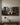Panoramic lost lamb canvas hung on a plaster villa wall, front view