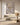 Textured white Jesus canvas above a bouclé sofa in a quiet luxury living room
