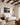 Wings as eagles Isaiah 40:31 canvas above an upholstered headboard in a luxury villa primary bedroom
