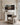 Panoramic Christian canvas above a carved marble fireplace mantel