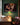 The Missing Piece canvas on a deep green study wall above a walnut desk and open Bible