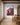 Sunrise ram and thornbush canvas beside an oak dining table