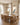 Psalm 91 canvas beside a long oak dining table under a brass chandelier