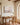 Peaceful Jesus canvas on the wall behind an oak writing desk in a home office