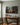 Wide lost lamb canvas above a walnut desk in a home study