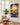 Lost lamb Christian canvas in a bright sunroom with rattan chair and terracotta tile floor