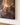 Close detail of the canvas corner showing the 1.25 inch gallery-wrapped edge and the light at the point of touch