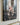 Close detail of the gallery-wrapped canvas edge showing the 1.25 inch wrap, matte print surface and the open scarred palm of Jesus