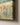 Close-up of wildflower meadow canvas corner showing gallery-wrap edge and fabric texture detail