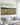 Psalm 46:10 wildflower meadow canvas in a bright coastal Cape Cod living room with white shiplap walls