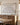 Joshua 1:9 canvas hanging above a farmhouse dining room sideboard