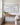 Joshua 1:9 farmhouse scripture canvas above a console table in a modern farmhouse living room