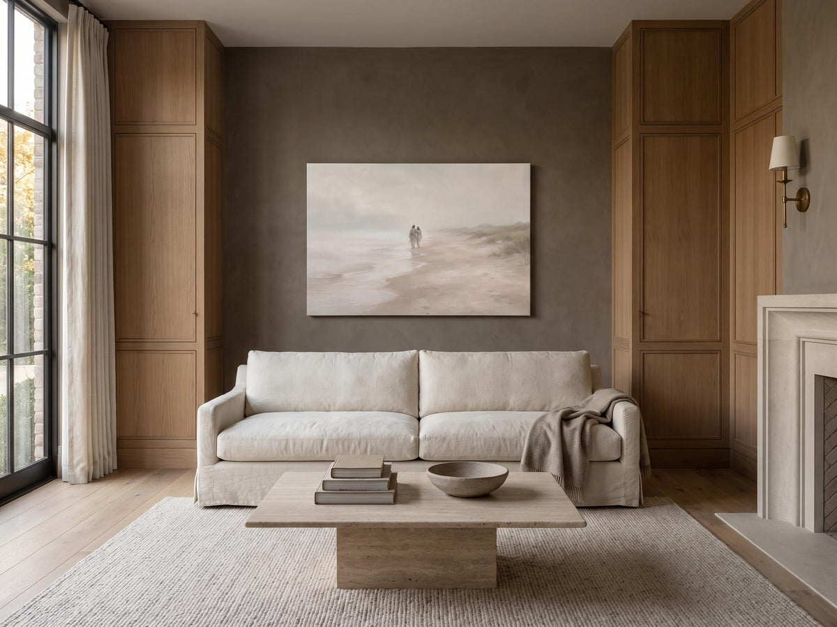 Every Step of the Way canvas above an ivory sofa in a modern coastal luxury living room