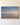 Front view of the painting-style canvas with the complete Footprints in the Sand poem and Isaiah 41:10 in white lettering over a dawn sky