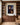 Crown of thorns portrait canvas print between walnut bookcases in a private home library