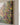 Close-up of the canvas corner showing the 1.25 inch gallery-wrapped edge with painted red apples and leaves continuing around the side