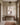 He ran, he rescued, he carried canvas print over a walnut console table in a taupe entry hall with a brass lantern