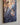 Close view of the gallery-wrapped canvas edge and corner showing Jesus' hand reaching toward the woman's raised hand