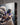 Close-up of gallery-wrapped canvas front surface and edge showing print detail and texture of Jesus protecting a lamb from wolves artwork