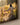 Close-up of gallery-wrapped canvas front surface and edge showing print detail of a lamb running to Jesus artwork