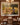 Wide canvas of a lamb running to Jesus above a wooden sideboard in a traditional dining room