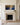 Panoramic canvas of Jesus praying in Gethsemane hanging above a cream limestone fireplace mantel