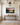 Bible verse sunset canvas above a white oak console table in a bright panelled hallway