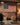 Man in the Arena American flag canvas hanging on a brick wall in a home garage gym