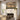 Second Coming of Christ canvas hung above a farmhouse fireplace mantel with shiplap wall