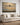 Jesus riding a white horse canvas print above a farmhouse living room sofa