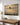 Second Coming of Christ canvas hung above a home office desk with daylight