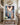 Epic canvas of the Return of Glory above a console table in a grand transitional entryway foyer
