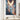 Canvas of Jesus returning in glory with fiery angel wings on a clean white wall in a bright modern minimalist living room