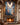 Canvas of Jesus with fiery angel wings above a stone fireplace mantel in a rustic mountain lodge great room
