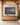 Large 32 x 48 inch nativity landscape canvas above a white oak sideboard in a timber-frame great room at Christmas