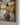 Close-up of the lower right corner of the vertical canvas showing the gallery-wrapped edge and Jesus kneeling in the stream